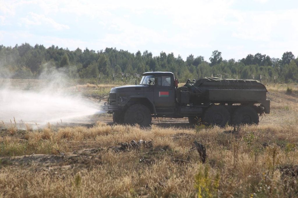 A vehicle at the Bretsky Training Grounds sprays liquids for disinfection, September 2, 2023. Image by the Ministry of Defense of Belarus.