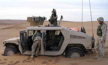 US Army HMMWVs got stuck in the desert sands